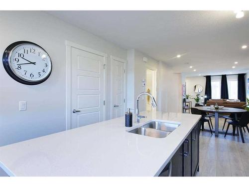 703-135 Mahogany Parade Se, Calgary, AB - Indoor Photo Showing Kitchen With Double Sink