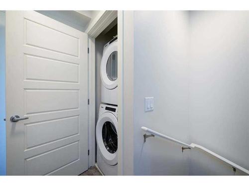 703-135 Mahogany Parade Se, Calgary, AB - Indoor Photo Showing Laundry Room