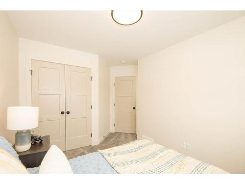 140 Emerald Drive, Red Deer, AB - Indoor Photo Showing Bedroom