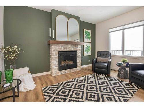 140 Emerald Drive, Red Deer, AB - Indoor Photo Showing Living Room With Fireplace