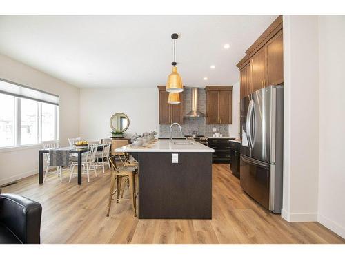 140 Emerald Drive, Red Deer, AB - Indoor Photo Showing Kitchen With Stainless Steel Kitchen With Upgraded Kitchen