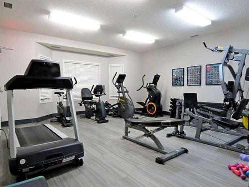 3118-3000 Sienna Park Green Sw, Calgary, AB - Indoor Photo Showing Gym Room