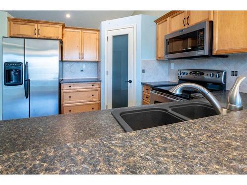 23 Victor Close, Red Deer, AB - Indoor Photo Showing Kitchen With Double Sink