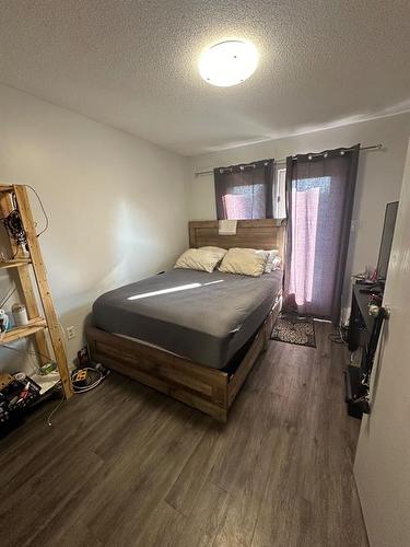 5007/5009 53 Street, Rocky Mountain House, AB - Indoor Photo Showing Bedroom