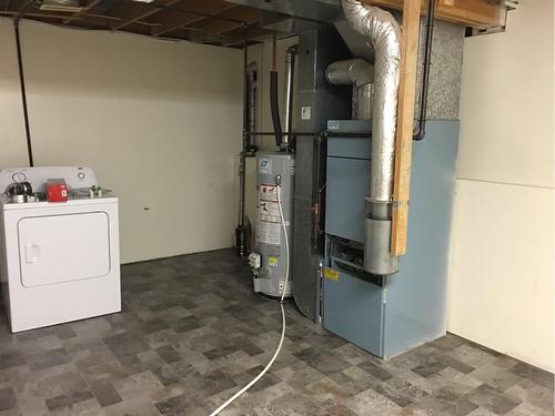 5007/5009 53 Street, Rocky Mountain House, AB - Indoor Photo Showing Laundry Room