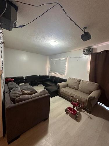 5007/5009 53 Street, Rocky Mountain House, AB - Indoor Photo Showing Living Room