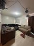 5007/5009 53 Street, Rocky Mountain House, AB  - Indoor Photo Showing Living Room 