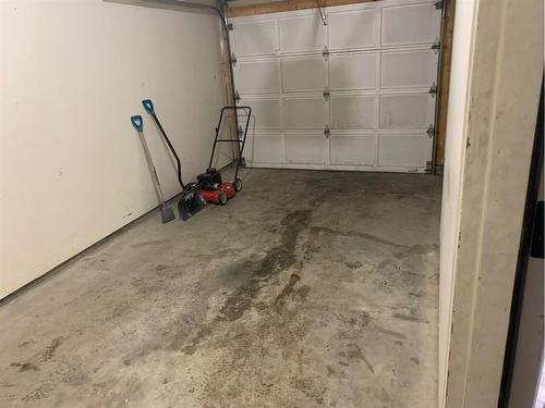 5007/5009 53 Street, Rocky Mountain House, AB - Indoor Photo Showing Garage