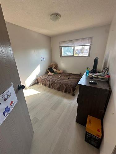 5007/5009 53 Street, Rocky Mountain House, AB - Indoor Photo Showing Bedroom