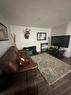 5007 53 Street, Rocky Mountain House, AB  - Indoor Photo Showing Living Room 