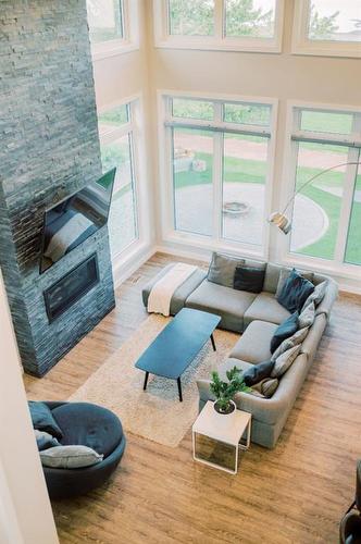 133 Lakeshore Drive, Rural Camrose County, AB - Indoor Photo Showing Living Room With Fireplace