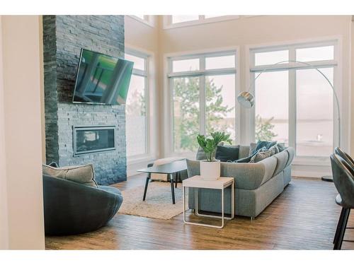 133 Lakeshore Drive, Rural Camrose County, AB - Indoor Photo Showing Living Room With Fireplace