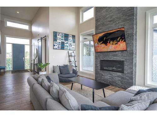 133 Lakeshore Drive, Rural Camrose County, AB - Indoor Photo Showing Living Room With Fireplace