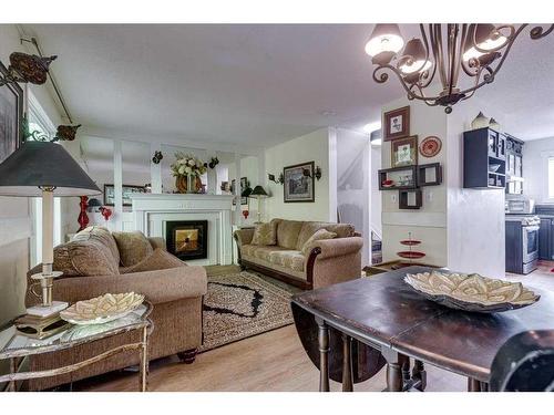 10-5806 61 Street, Red Deer, AB - Indoor Photo Showing Living Room With Fireplace