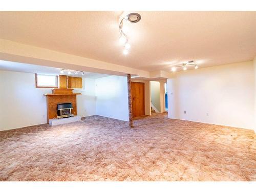 228 4 Avenue South, Big Valley, AB - Indoor With Fireplace