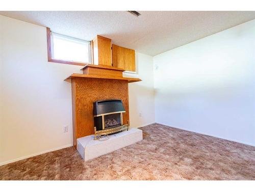 228 4 Avenue South, Big Valley, AB - Indoor With Fireplace