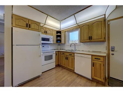 48 Nash Street, Red Deer, AB - Indoor Photo Showing Kitchen With Double Sink