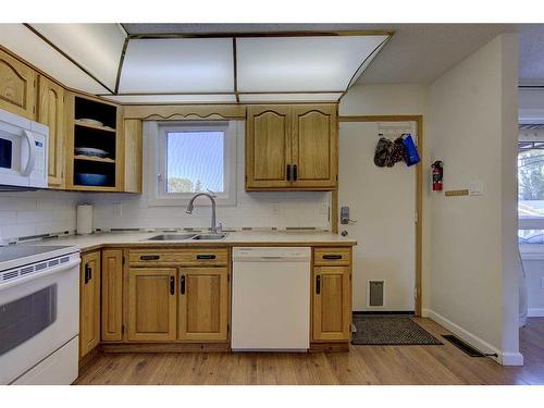 48 Nash Street, Red Deer, AB - Indoor Photo Showing Kitchen With Double Sink