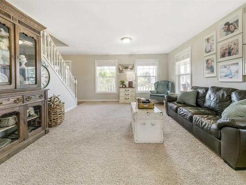 205 South 150 Street West, Raymond, AB - Indoor Photo Showing Living Room