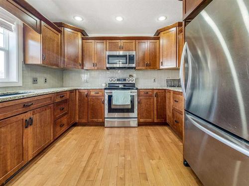 205 South 150 Street West, Raymond, AB - Indoor Photo Showing Kitchen