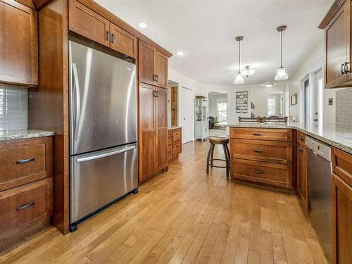 205 South 150 Street West, Raymond, AB - Indoor Photo Showing Kitchen