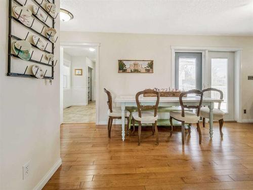 205 South 150 Street West, Raymond, AB - Indoor Photo Showing Dining Room