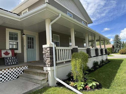 205 South 150 Street West, Raymond, AB - Outdoor With Deck Patio Veranda