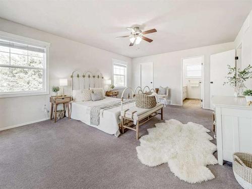 205 South 150 Street West, Raymond, AB - Indoor Photo Showing Bedroom