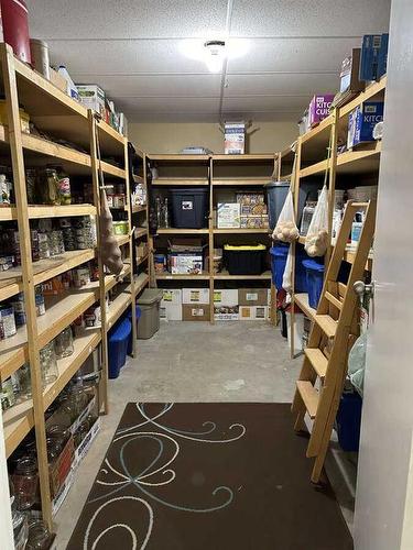 205 South 150 Street West, Raymond, AB - Indoor With Storage