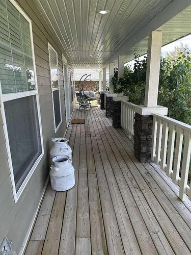 205 South 150 Street West, Raymond, AB - Outdoor With Deck Patio Veranda With Exterior