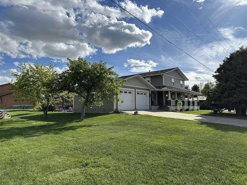 205 South 150 Street West, Raymond, AB - Outdoor With Deck Patio Veranda