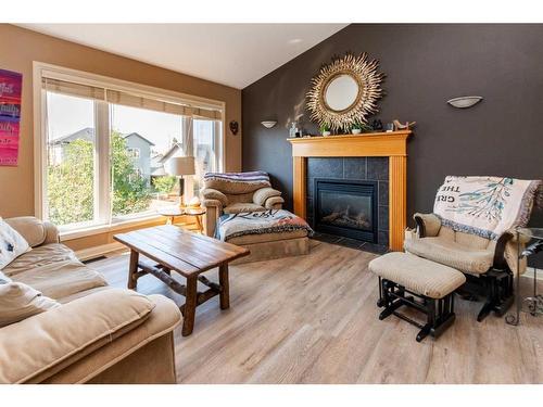 134 Issard Close, Red Deer, AB - Indoor Photo Showing Living Room With Fireplace