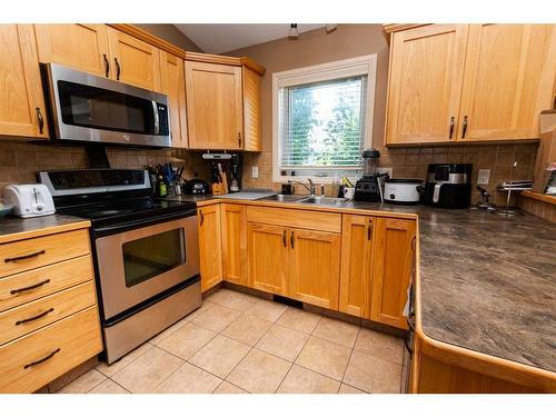 134 Issard Close, Red Deer, AB - Indoor Photo Showing Kitchen With Double Sink