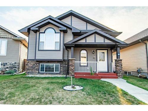 72 Ibbotson Close, Red Deer, AB - Outdoor With Deck Patio Veranda With Facade