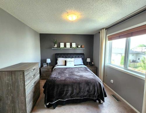 22 Jewell Street, Red Deer, AB - Indoor Photo Showing Bedroom