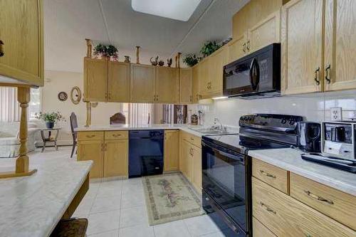 307-4614 47A Avenue, Red Deer, AB - Indoor Photo Showing Kitchen