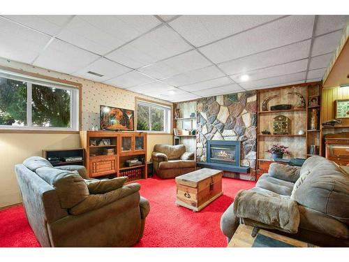 6121 Hamilton Drive, Red Deer, AB - Indoor Photo Showing Living Room With Fireplace