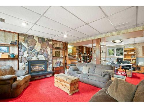 6121 Hamilton Drive, Red Deer, AB - Indoor Photo Showing Living Room With Fireplace