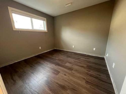 104 2 Street Nw, Sundre, AB - Indoor Photo Showing Other Room