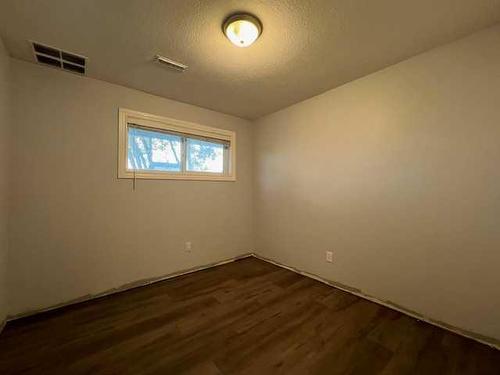 104 2 Street Nw, Sundre, AB - Indoor Photo Showing Other Room