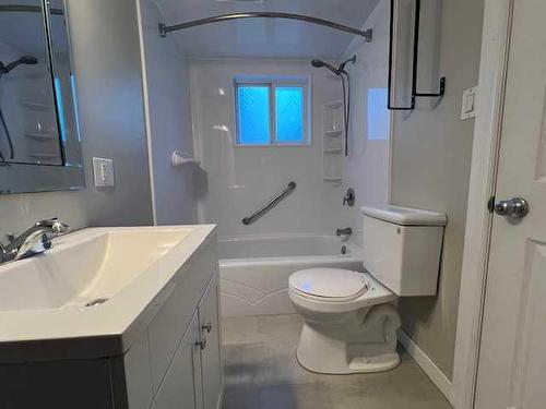 104 2 Street Nw, Sundre, AB - Indoor Photo Showing Bathroom