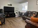 104 2 Street Nw, Sundre, AB  - Indoor Photo Showing Living Room 