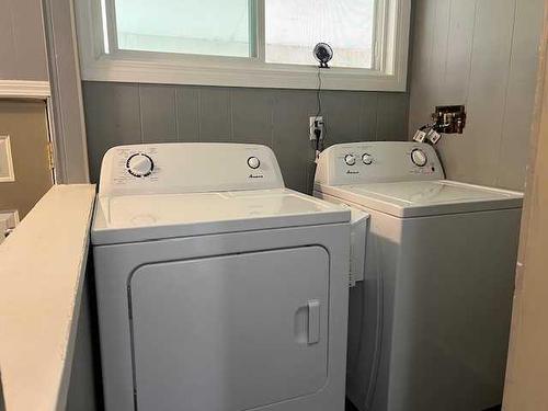 104 2 Street Nw, Sundre, AB - Indoor Photo Showing Laundry Room