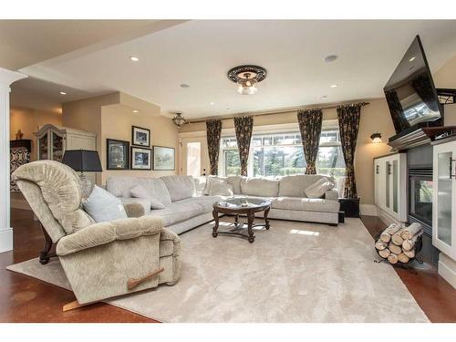 38425 Range Road 284, Rural Red Deer County, AB - Indoor Photo Showing Living Room With Fireplace