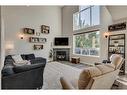 21 Morningside Bay Sw, Airdrie, AB  - Indoor Photo Showing Living Room With Fireplace 