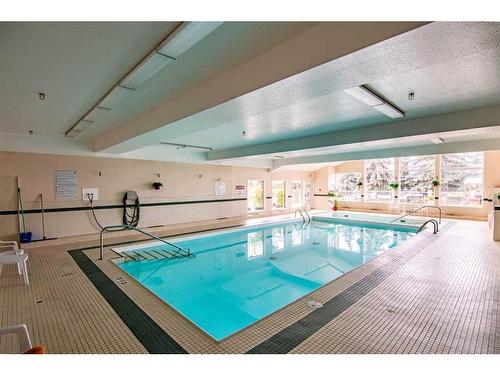 325-4512 52 Avenue, Red Deer, AB - Indoor Photo Showing Other Room With In Ground Pool