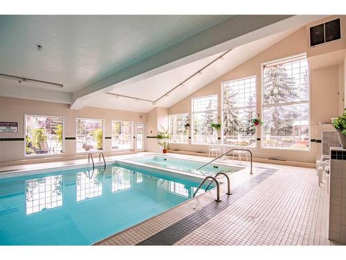 325-4512 52 Avenue, Red Deer, AB - Indoor Photo Showing Other Room With In Ground Pool