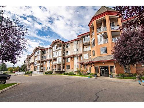 325-4512 52 Avenue, Red Deer, AB - Outdoor With Balcony With Facade