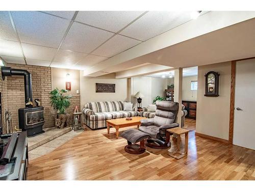 40 28161 Hwy 596, Rural Red Deer County, AB - Indoor With Fireplace