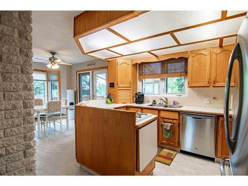 40 28161 Hwy 596, Rural Red Deer County, AB - Indoor Photo Showing Kitchen With Double Sink